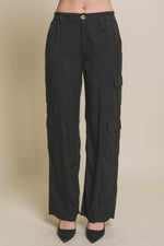 Comfortable black cargo pants with multiple pockets, ideal for everyday wear.