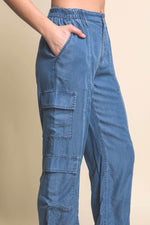 Comfortable women's Tencel cargo pants with multiple pockets, showcased in the image.