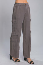 Stylish women's full-length cargo pants with multiple pockets, crafted from comfortable Tencel fabric, showcased against a plain background.