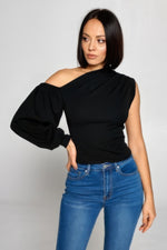 Stylish one-shoulder black top by CCWHOLESALECLOTHING, featuring puffed sleeve and fitted silhouette.