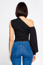 Sleek one-shoulder top in black, showcasing a stylish and modern design for the modern woman.