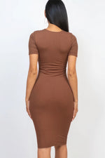 Ribbed bodycon midi dress in brown, showcasing a sleek and form-fitting silhouette.