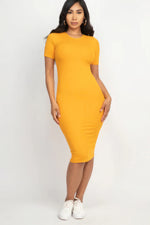 Ribbed bodycon midi dress in vibrant yellow, worn by a young woman with long dark hair posing against a plain white background.